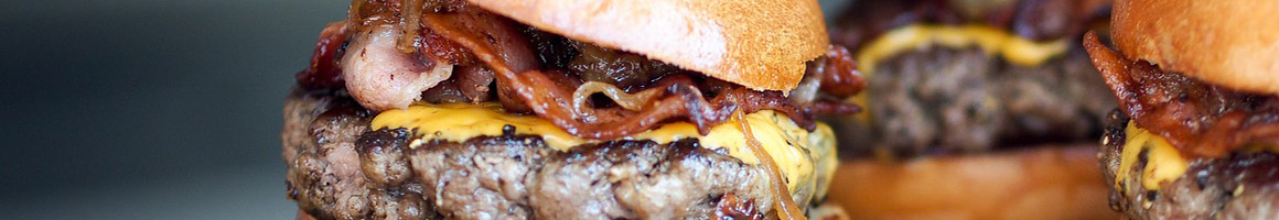 Eating Burger at King Louie's Drive-In restaurant in Wood River, IL.